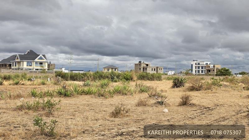 A 50 by 100 plot in Juja Farm, Mwireri, with houses already built nearby